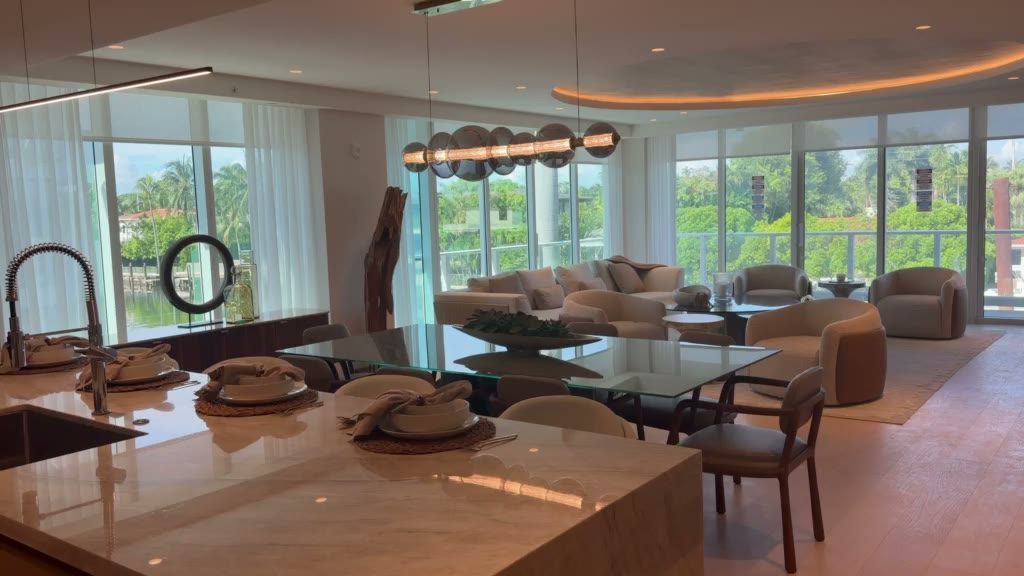 Shades and drapery in a living room overlooking a garden